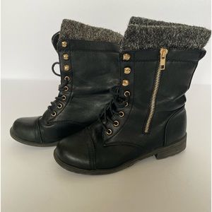 Black lace up boots.